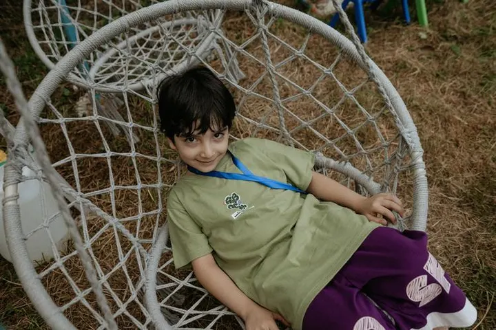 Support Alexander, the son of a fallen hero, with group therapy sessions