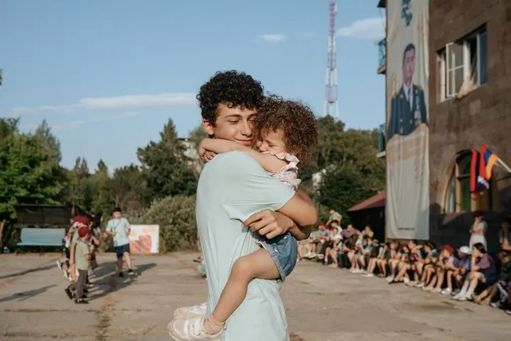Support Lia — the daughter of a fallen hero — with group therapy