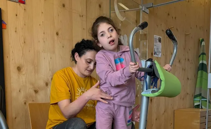 Provide free physiotherapy services to 100 children